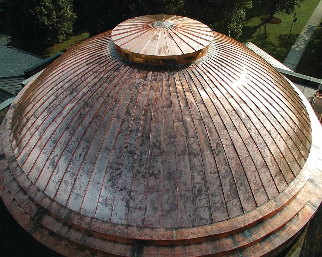 Craftsman Roofing crew installing a new roof in Alice Winter Gardens